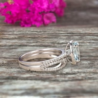 10k бяло злато 2. Карат 8x овално изрязване на годежни пръстени Aquamarine с усукана сватбена лента диаманти Halo Design